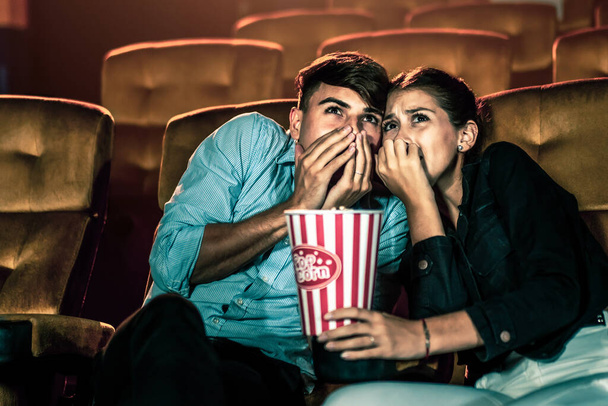 A couple lover watching movie in cinema theater. - Photo, Image
