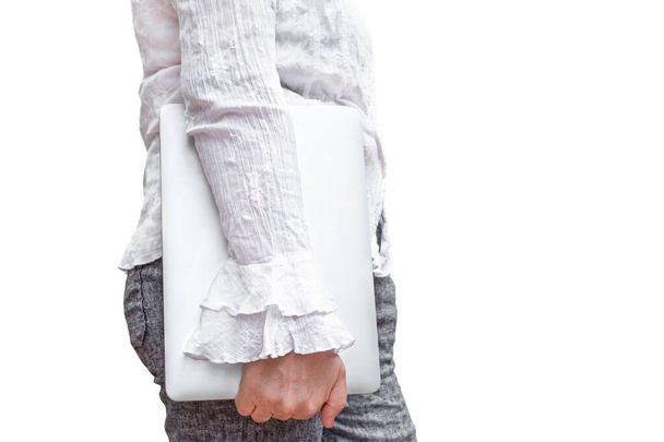 woman in white shirt, carries a computer, isolated on white. - Photo, Image