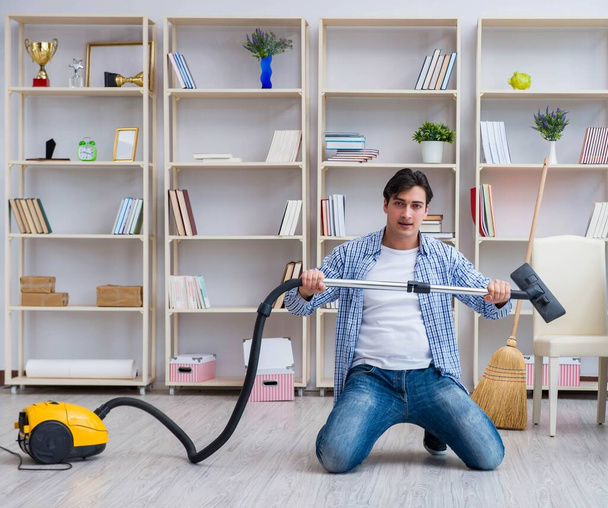 Man doing cleaning at home - Fotoğraf, Görsel