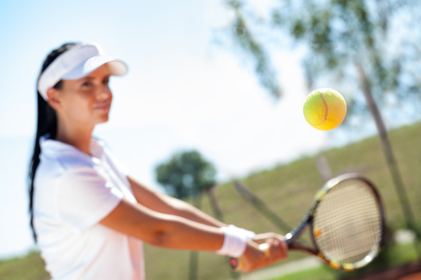 Girl playing tennis - Valokuva, kuva