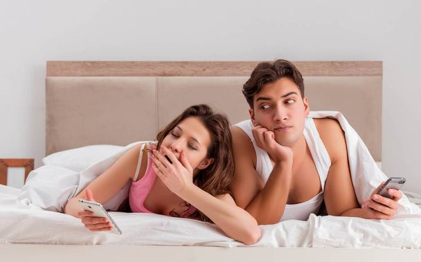 Family conflict with wife husband in bed - Foto, immagini