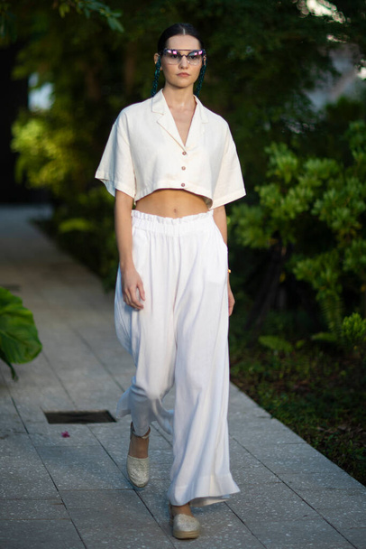 A model walks the runway for Nawa Resortwear Swimwear Summer collection 2021 fashion show during Destination Colombia 2020 at the Miami Design District in Miami, FL on November, 14th 20201 - Foto, Imagen