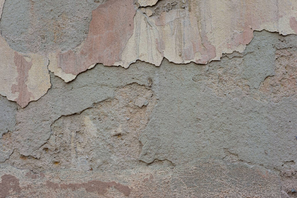 家の中で屋外石膏の暖かい色合いヴィンテージテクスチャグランジ壁のテクスチャの古い剥離石膏 - 写真・画像