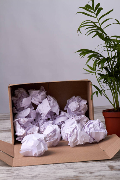 Crumpled paper balls filler in cardboard box. - Photo, Image