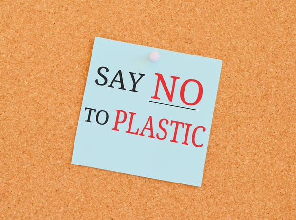 Say no Plastic reminder note over a kork board.Concept meaning ways can eliminate waste protect your environment.Business photo text environmentally responsible consumer behavior.The concept of plastic pollution. - Fotografie, Obrázek
