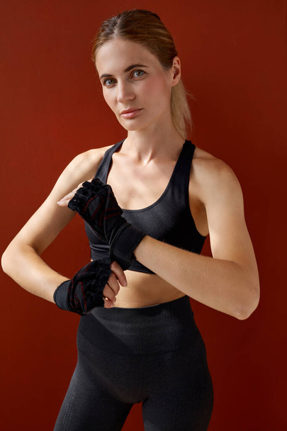 confident fit female bandage hand, going to box - Foto, imagen