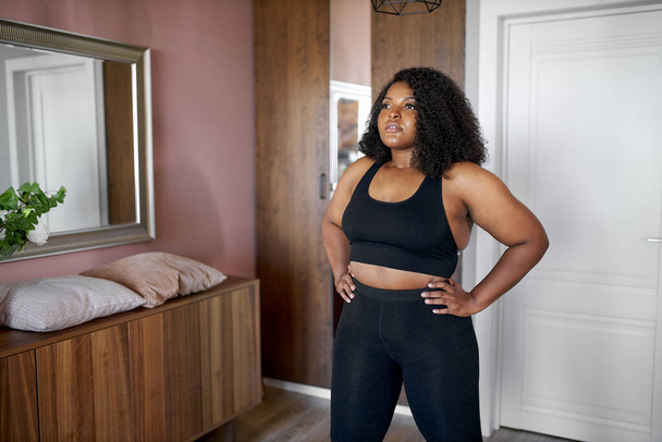 attractive afro american black female engaged in fitness at home - Valokuva, kuva