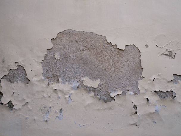 A closeup shot of peeling paint on a wall - Valokuva, kuva