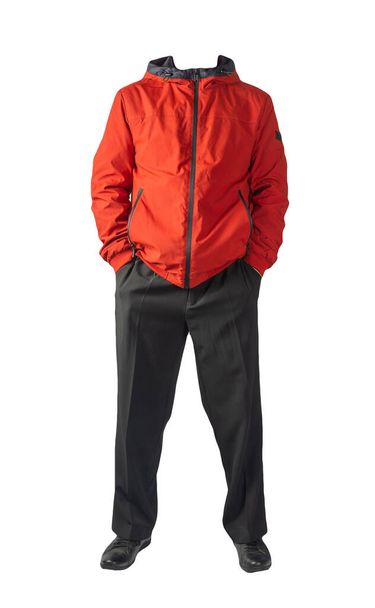 men's red jacket with a hood ,black pants  and black  leather shoes isolated on white background. men's autumn clothes - 写真・画像