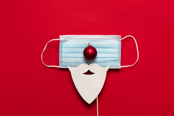Festive christmas Santa Claus face made from face mask and decorations - Valokuva, kuva