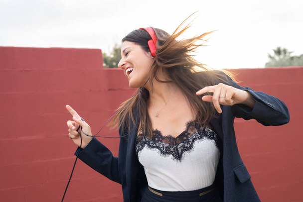 beautiful woman dancing with music headphones - Фото, изображение