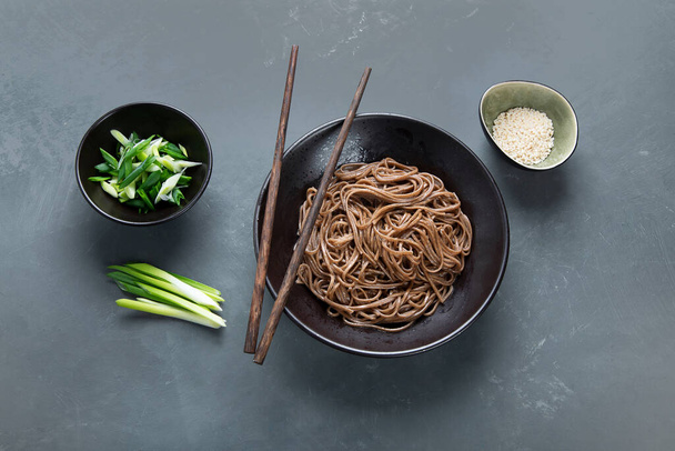 Soba noodles with shrimps and vegetables. Asian style healthy food. Top view, copy space - Foto, Imagen