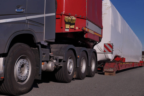 Travel break. Close-up of a specialist truck for transporting oversized loads.  - Photo, Image