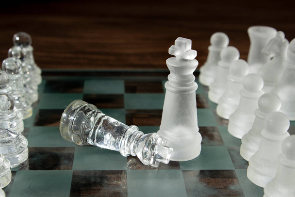 Chess check Mate victory move with anoter pieces behind. Seletive focus. - Photo, Image