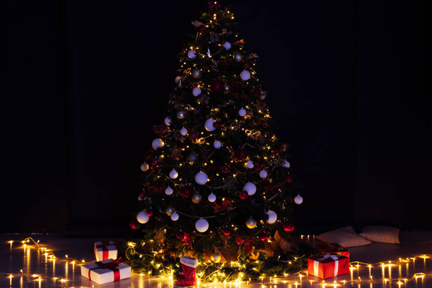 Kerstboomverlichting en oudejaarsavond - Foto, afbeelding