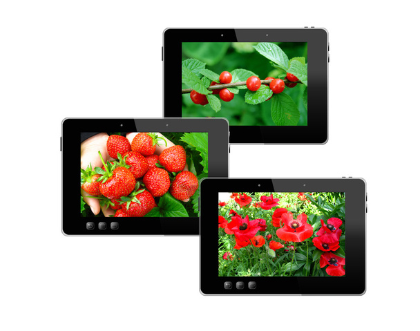 three black tablets with motley pictures - Photo, Image