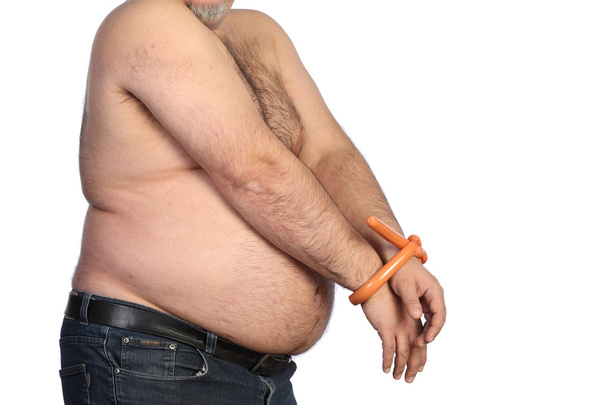 Hombre gordo y salchichas
 - Foto, imagen