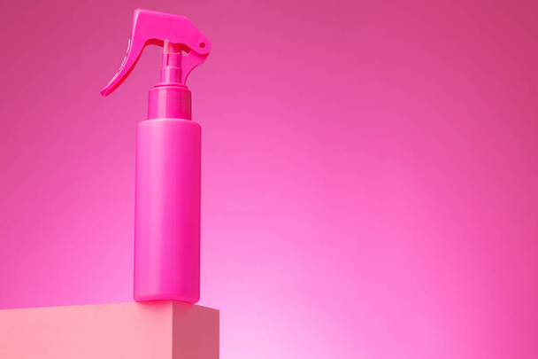 Skincare beauty products container against pink background - Φωτογραφία, εικόνα