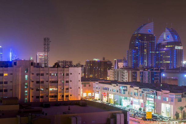  Aerial night view with neon light of Riyadh with Twin building of Alinma Bank  in Riyadh, Saudi Arabia - 写真・画像