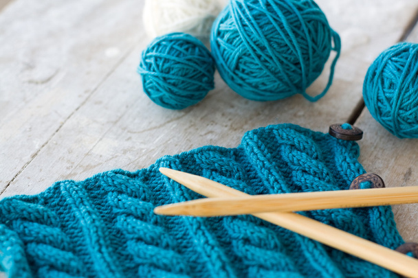 Knitting pattern and needles on a wooden background - Photo, Image