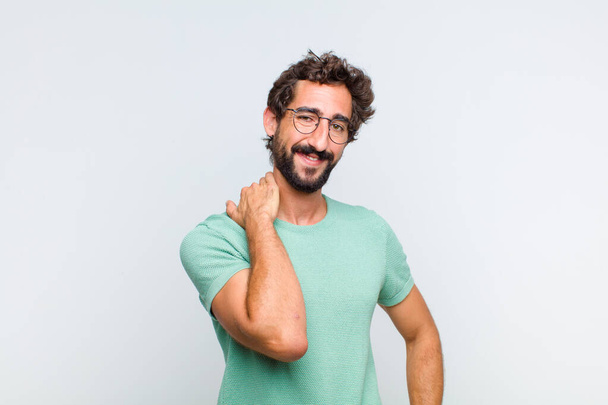 young bearded man laughing cheerfully and confidently with a casual, happy, friendly smile - Foto, Imagem