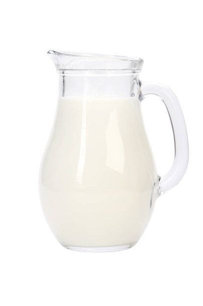 A vertical shot of a jug full of milk on a white background - Fotografie, Obrázek