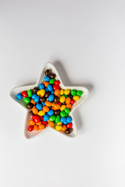 colorful m&m's candies on white background - Fotó, kép