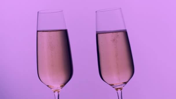 Two champagne glasses toasting - Footage, Video