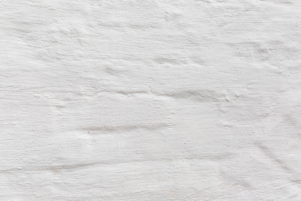 Surface of a white concrete wall. Background. Space for text. - Фото, изображение