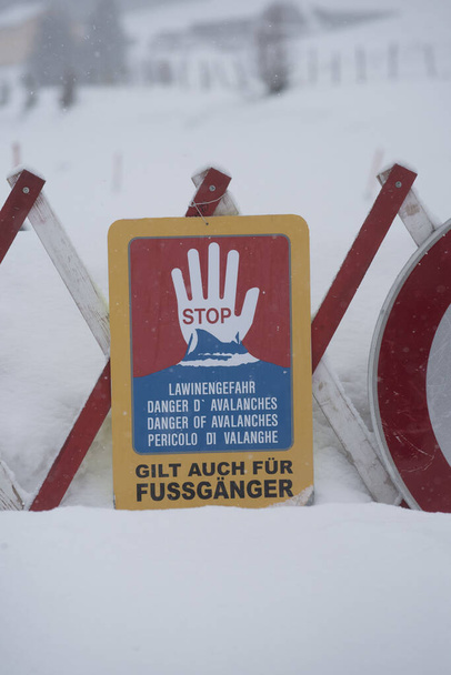 danger of avalanches warning sign in a snowy landscape in winter - Photo, Image