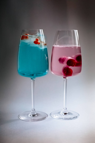 glass of water and blue curacao with ice - Foto, immagini