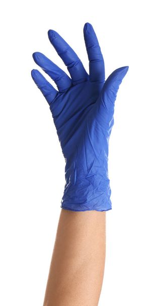 Woman in blue latex gloves on white background, closeup of hand - Foto, afbeelding