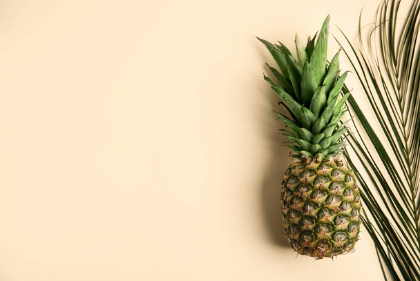 Fresh ripe juicy pineapple on beige background, top view. Space for text - Photo, Image