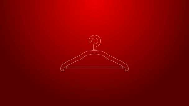 Groene lijn Hanger garderobe pictogram geïsoleerd op rode achtergrond. Cloakroom icoon. Kleding service symbool. Wasserij hangerbord. 4K Video motion grafische animatie - Video
