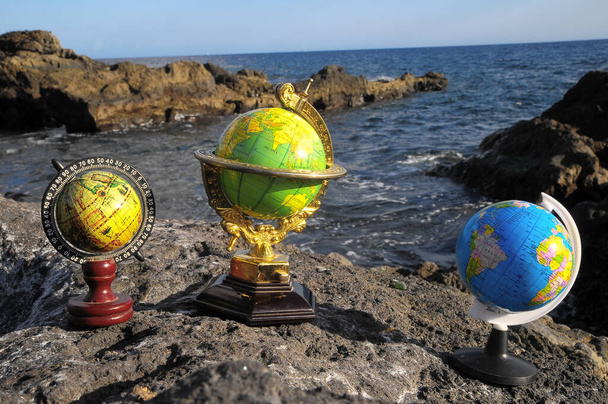 Ancient Vintage Globes Planet Earth near the Atlantic Ocean - Photo, Image