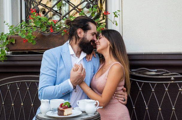 happy loving couple in love outdoors in cafe, relax - Fotoğraf, Görsel