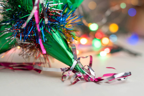 Traditional colorful pinata and christmas lights in bokeh. Christmas decoration - Foto, Imagen