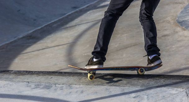 A young male skater in the skate park - Photo, Image