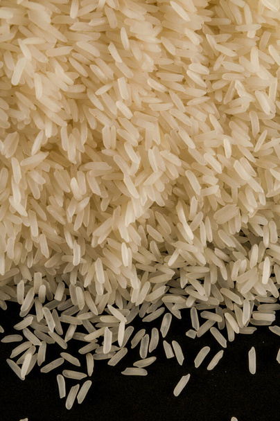 Foto foto van biologische bruine rijst textuur achtergrond - Foto, afbeelding