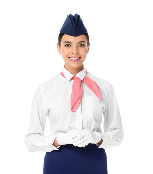 Beautiful stewardess on white background - Φωτογραφία, εικόνα