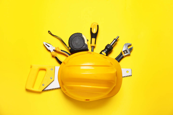 Set of construction tools on color background - Foto, afbeelding