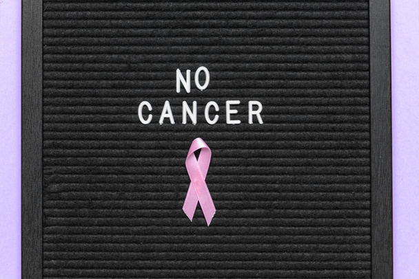 文字付きボード｜No CANCER and pinkリボンon color background - 写真・画像