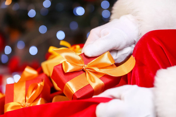 Santa Claus with bag full of Christmas gifts - Foto, Imagem