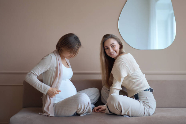 Lesbian couple waiting for baby, woman posing with her pregnant girlfriend - Zdjęcie, obraz