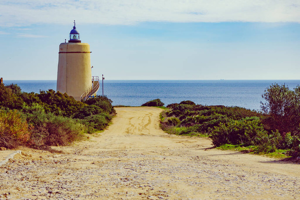 Carbonera lighthouse located on Punta Mala, La Alcaidesa, Spain. Lantern overlooks the Strait of Gibraltar. - Фото, зображення