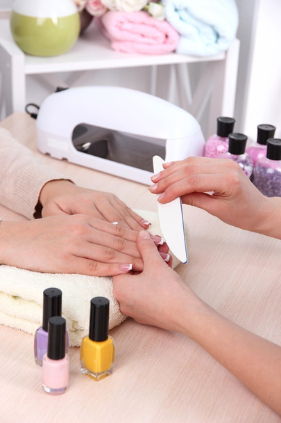 Manicure process in beauty salon close up - Zdjęcie, obraz
