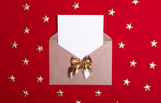 Envelope letter with an empty gladent and a place for text on a red background with stars. - Photo, Image