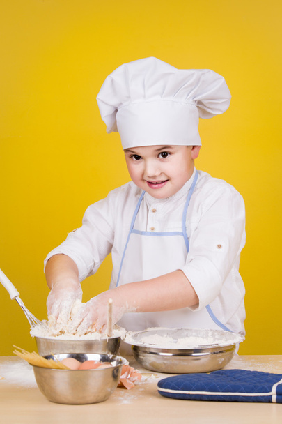 Little boy chef in uniform - Fotó, kép