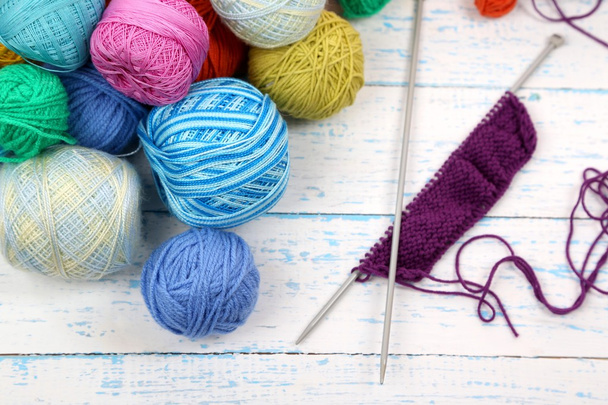 Yarns for knitting on wooden table close-up - Valokuva, kuva
