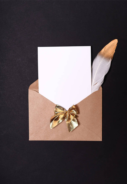 Envelope letter with an empty gladent and a place for text on a black background. - Foto, Bild